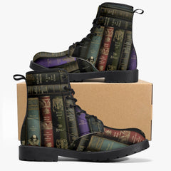 lace up combat boots printed with a vintage books print.. books shown are the raven, oscar wilde, shakespeare, jane austen and others. The boots have a black rubber sole and are just above ankle length.