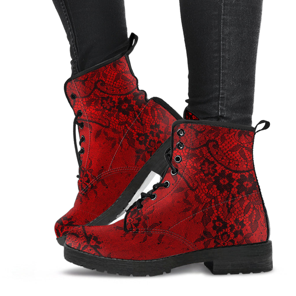 Red lace up combat boots with black lace printed on them.  Just above ankle length, rubber sole for great traction.  Gothic style boots.