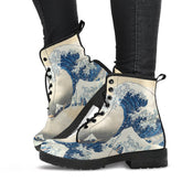 the great wave woodcut custom printed onto a combat style boot, just above ankle length, the boots have black soles and black lacing.