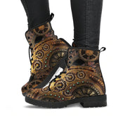 image shows steampunk lace up combat boots just above ankle length.  The boots feature a steampunk clockwork gears print in browns and gold tones.  The boots have black soles and black lacing.