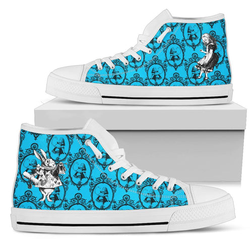 turquoise alice in wonderland hi top sneakers with a white sole and toe cap and white lacing.  A vibrant turquoise print on the sides with a background of alice holding the flamingo repeating pattern.  The foreground print is of the white rabbit and alice tumbling down the rabbit hole