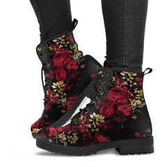 gothic red roses lace up combat boots.  The just above ankle length boots feature a red roses and gold leaves print on a back background.  The sole of the boots is black