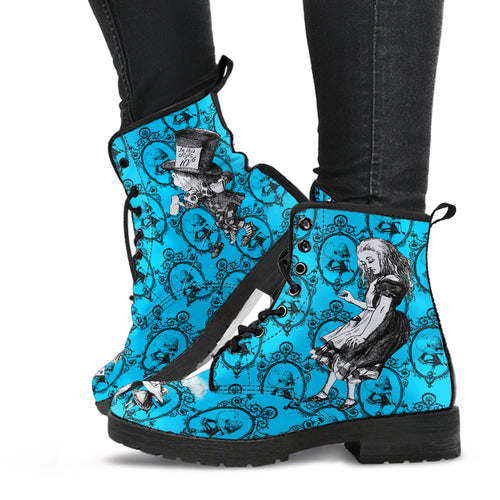 Alice in wonderland turquoise lace up combat boots.  A vibrant turquoise background with alice, the mad hatter, white rabbit and the caterpillar printed on the sides and toes. 