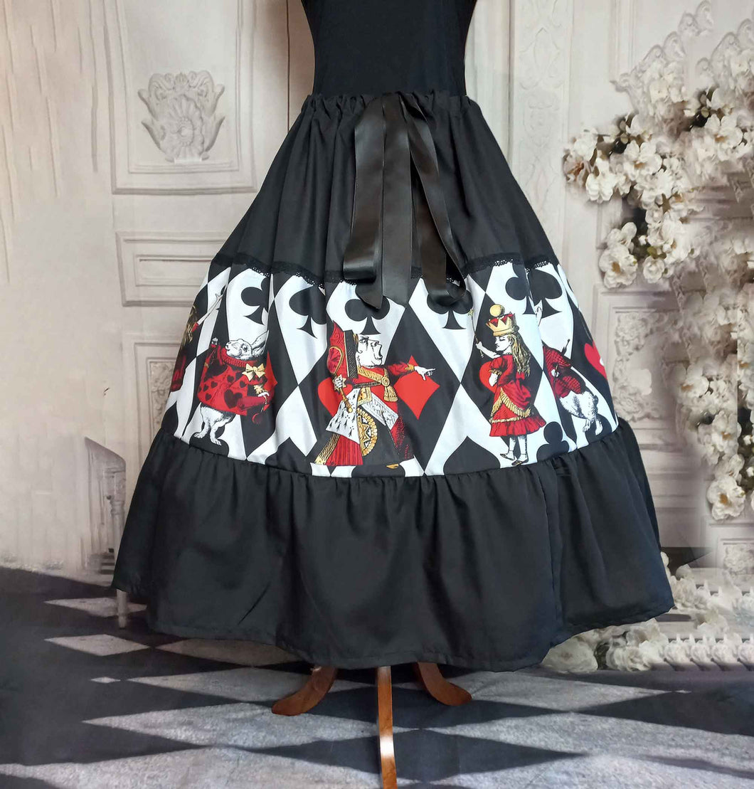 Alice in Wonderland queen of hearts tea party skirt.  A mid calf length skirt in vibrant red, gold, black and white.  This full skirt has an adjustable waist. 
