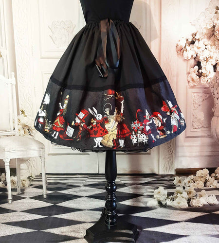 alice in wonderland full 50's style skirt.  Black lace print with red and gold Alice in Wonderland Characters around the bottom half of the knee length skirt.  Adjustable waist up to 50 inches, suitable for plus sizes. 
